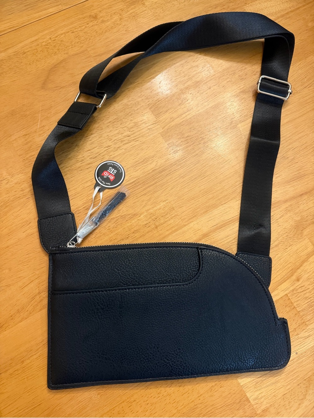 Save the Girls Touch Screen Blk Crossbody Bag w/RFID Tech/Adjustable Strap NWOT
